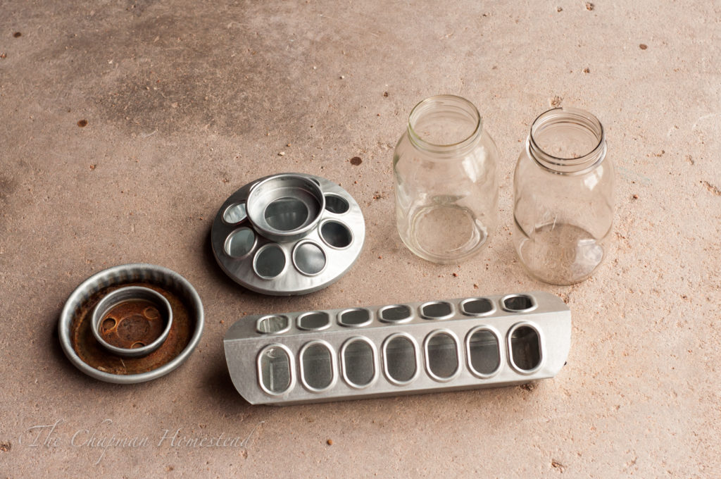 Picture of food and water containers to use in the brooder.